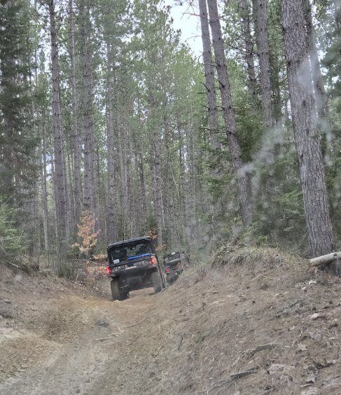 ATV on the trail from behind