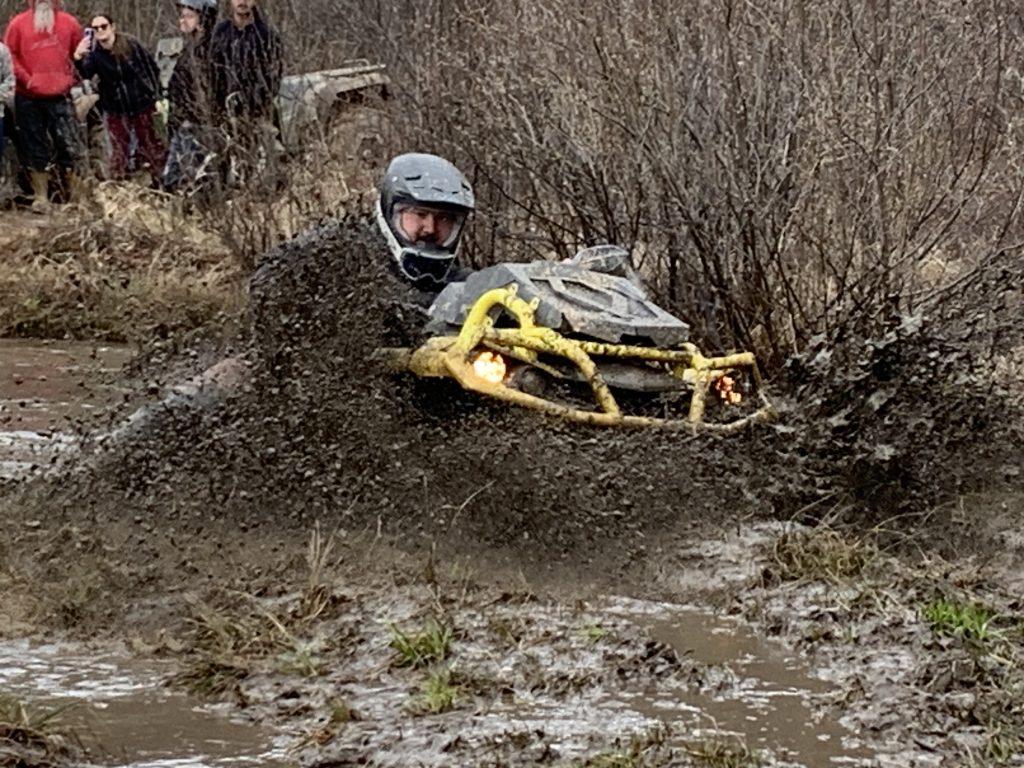 ATV deep in mud